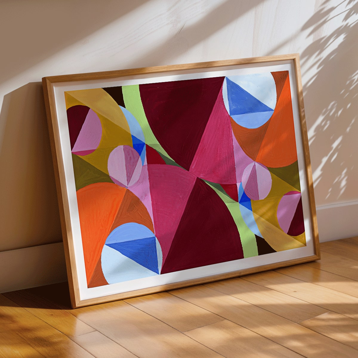 Poster of abstract geometric shapes in vibrant colors from Area Broken by Perpendiculars by Joseph Schillinger, framed and displayed in modern living room decor