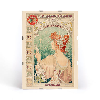 Art Nouveau poster by Alphonse Mucha featuring a woman in a corset with mirror and floral details Manufacture Royale De Corsets, framed and displayed in modern living room decor
