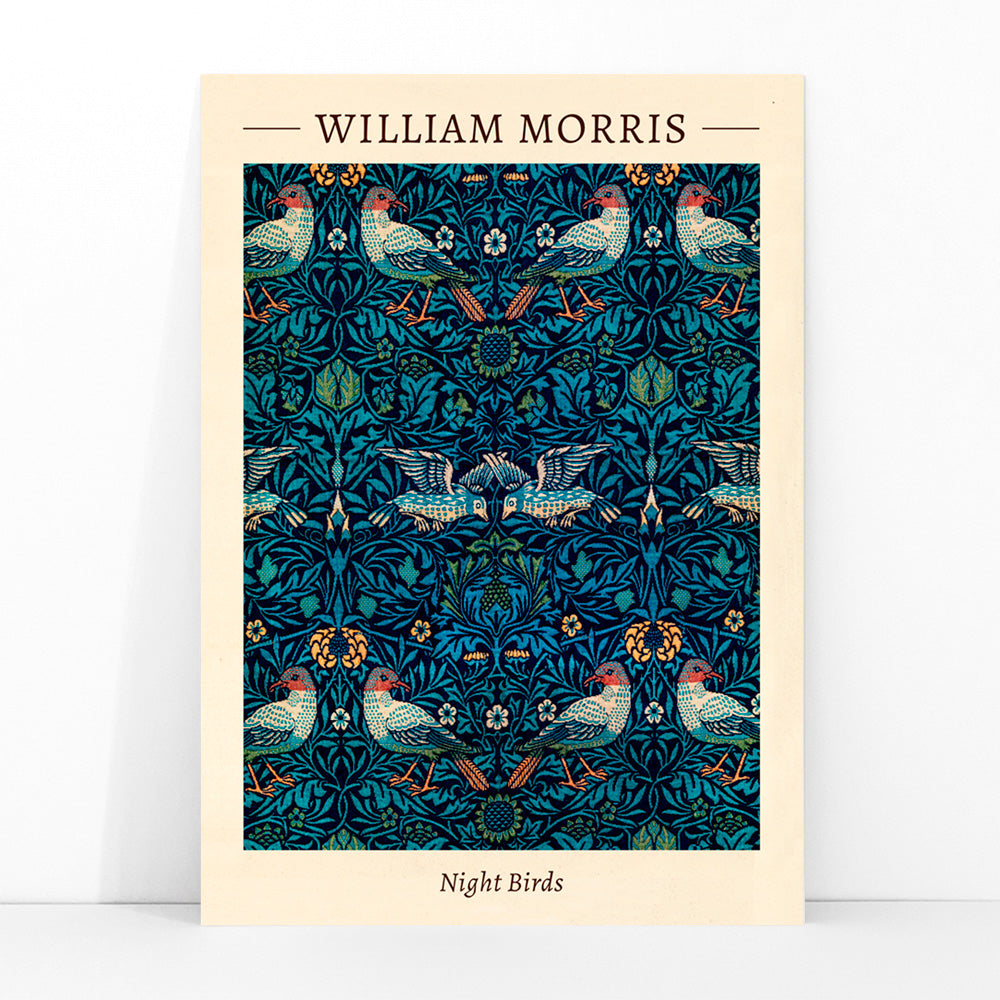 Night Birds by William Morris colorful patterned illustration and poster with intricate birds and floral designs in rich blue and green tones, framed and displayed in modern living room decor