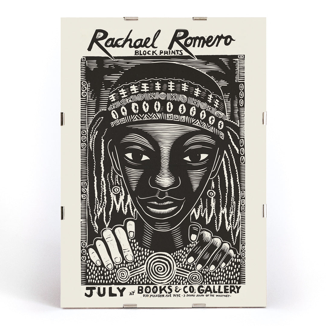 Black and white portrait block print poster with intricate patterns by Rachael Romero at Books and Co gallery, framed and displayed in modern living room decor