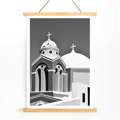 Black and white artwork of a traditional church dome and cross in Santorini Greece by artist Santorini Greece poster featuring classic architecture against a clear sky, with wooden magnetic frame on white background