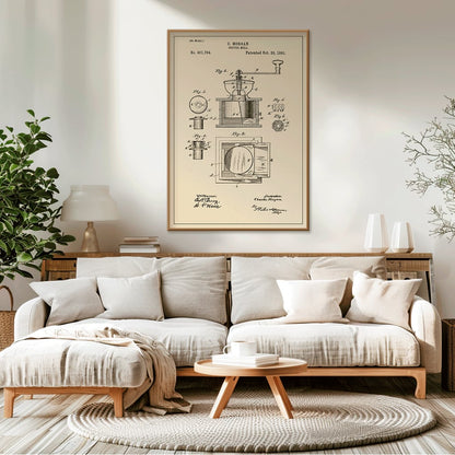 Vintage mechanical drawing and patent sketch of a coffee grinder titled Coffee Mill by C Morgan featuring detailed illustrations and technical specifications, framed and displayed in home decor