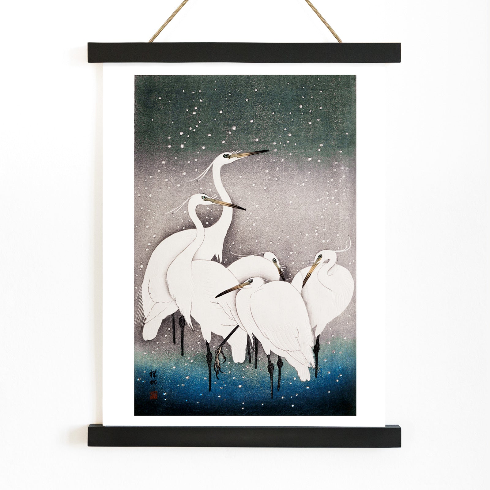 Group of egrets standing together in the snow artwork by Ohara Koson poster, with wooden magnetic frame on white background