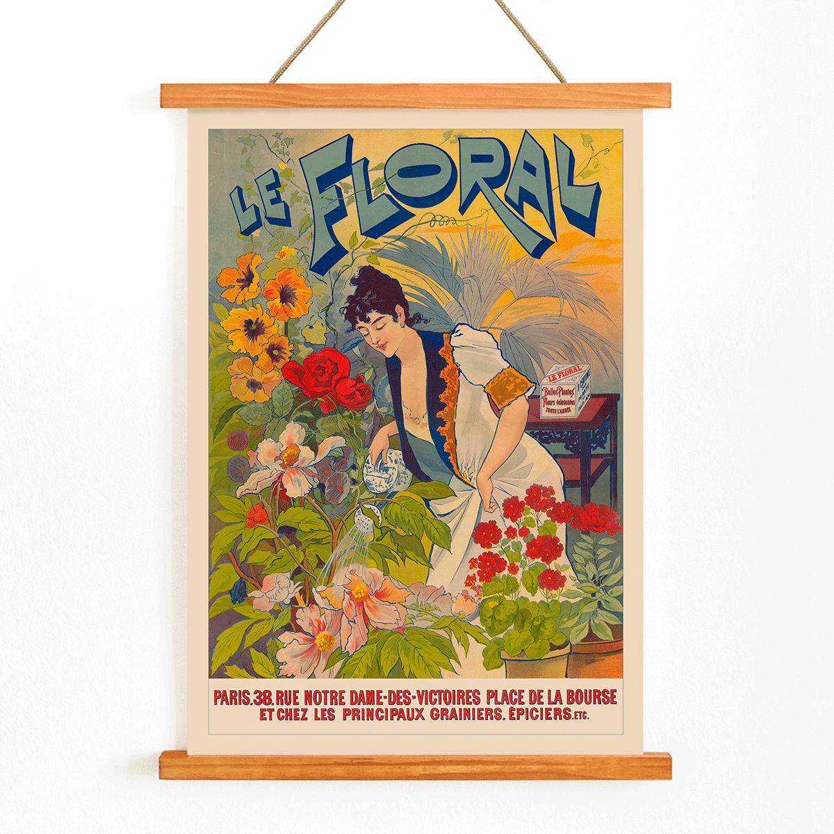Le Floral poster featuring a woman tending and watering vibrant colorful flowers with bold Le Floral text in the background, with wooden magnetic frame on white background