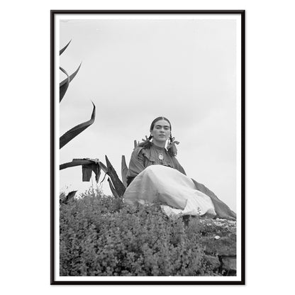 Frida Kahlo and Senora Diego Rivera seated beside agave plant photographed by Toni Frissell poster artwork, with black aluminium frame on white background