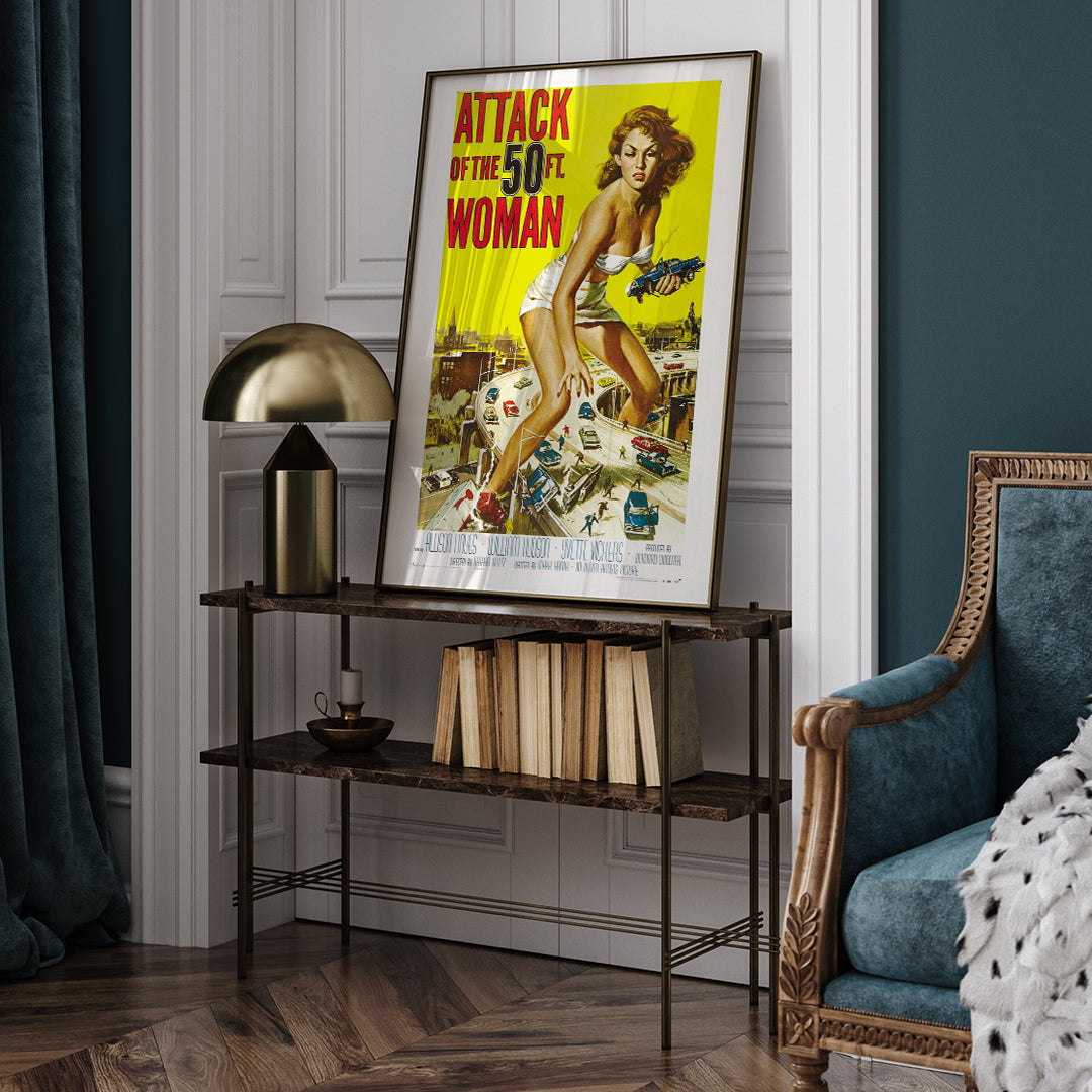 Giant woman towering over city and highway holding cars Attack of the 50ft Woman poster artwork by Reynold Brown, framed and displayed in home decor