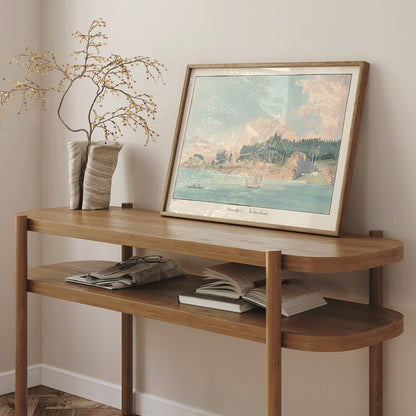 Seaside village and coastal landscape painting with sailboats and forested hill titled Friendly Cove Nootka Sound by Charles Hamilton Smith, framed and displayed in home decor