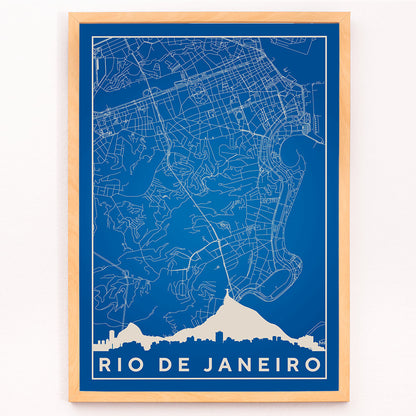 Minimalist blue and white Rio de Janeiro map poster by Moryarty featuring detailed street lines and city skyline silhouette, framed and displayed in modern living room decor