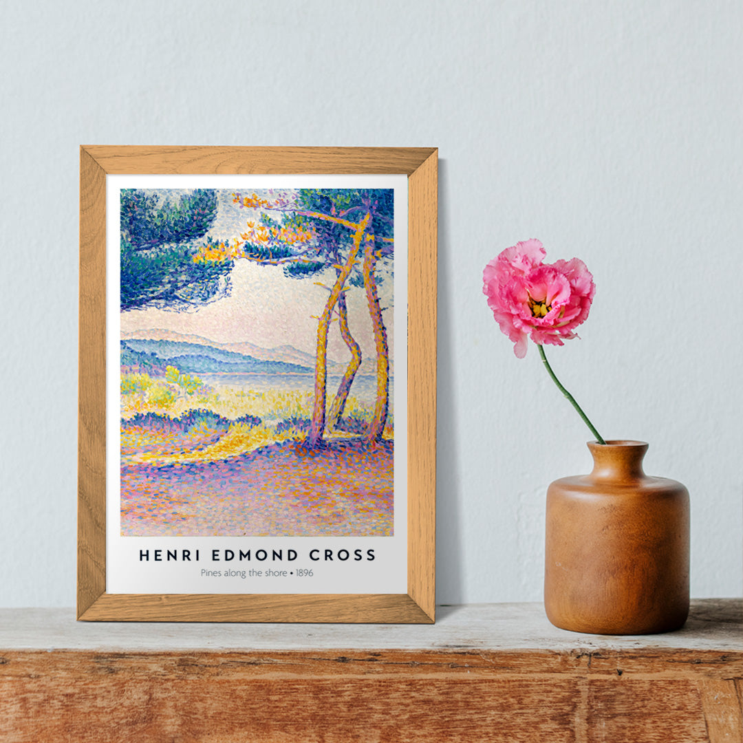 Colorful seascape poster of Pines Along the Shore by Henri Edmond Cross featuring vibrant pine trees and pointillist landscape, framed and displayed in home decor