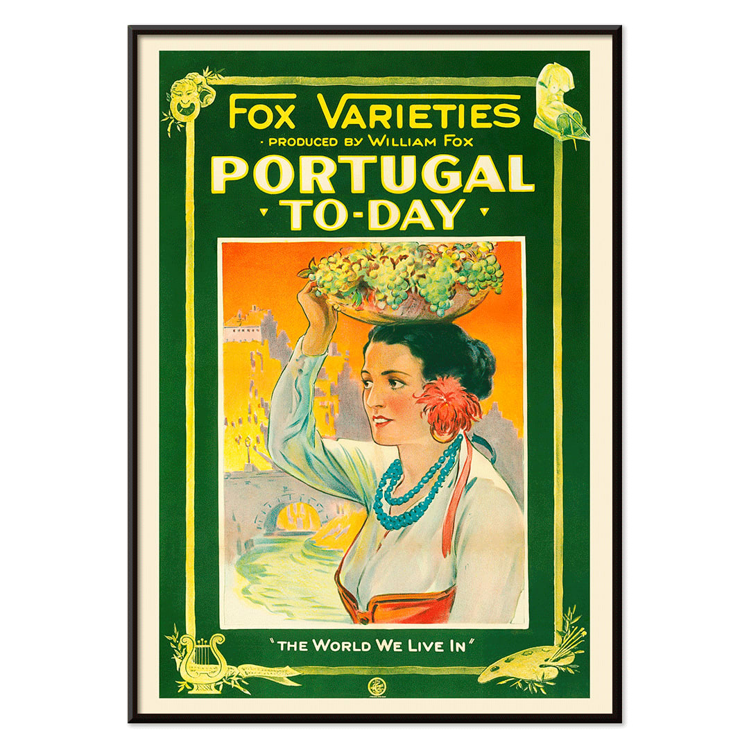 Colorful vintage poster of Portugal Today featuring a woman in traditional attire carrying grapes and fruit on her head with vibrant backdrop by William Fox and Anonymous, with black aluminium frame on white background