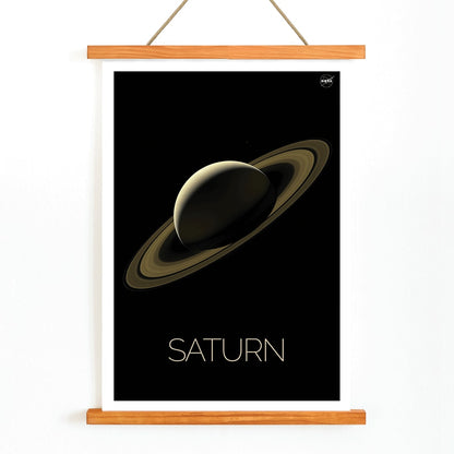 NASA illustration and poster of planet Saturn with rings against black background, with wooden magnetic frame on white background