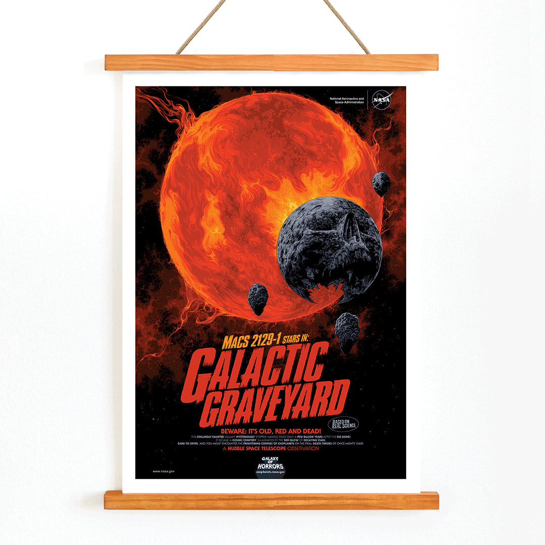 Fiery red star and dark planetary debris in space from Galactic Graveyard by NASA wall art poster for home decor, with wooden magnetic frame on white background